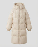 Women's extra-long padded hooded coat with generous square quilting, windproof outer shell, and comfortable thermal lining