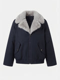 Women's short padded winter jacket with voluminous faux fur collar and windproof outer shell