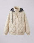 Women's oversized short jacket with diamond quilting, stand-up collar, and flap pockets