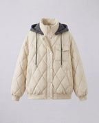 Women's oversized short jacket with diamond quilting, stand-up collar, and flap pockets