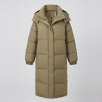 Women's extra long quilted thermal coat with hood, two-way zipper and noise-reducing outer material