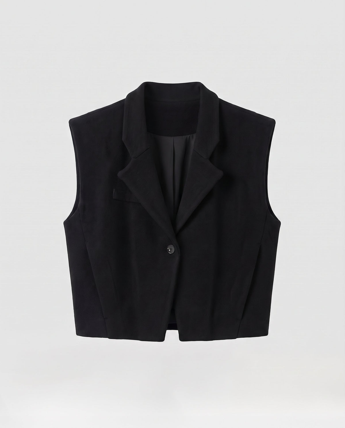 Women’s short-cut knitted vest with lapel collar and structured shoulder area Fashion Glam