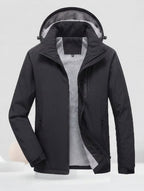 Men's waterproof hooded transitional jacket with thermal lining, windproof membrane, and concealed zipper