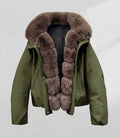 Women's short parka with voluminous faux fur collar, padded thermal lining, and concealed snap placket