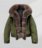 Women's short parka with voluminous faux fur collar, padded thermal lining, and concealed snap placket