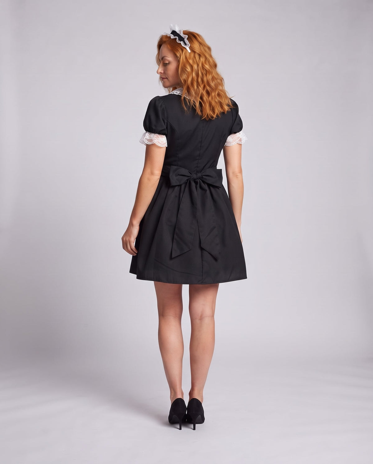 Women's costume as a playful maid with ruffles and lace details Fashion Glam