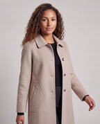 Ladies elegant mid-length wool blend coat with round neck collar and visible button placket Fashion Glam