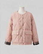 Women's quilted boxy short jacket with concealed snap button placket and extra large patch pockets