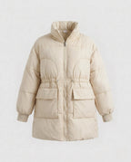 Women's feminine A-line quilted parka with adjustable drawstring, high stand-up collar, and large flap pockets