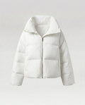 Women's cropped quilted jacket with oversized hood, lightweight thermal filling, and rounded hem