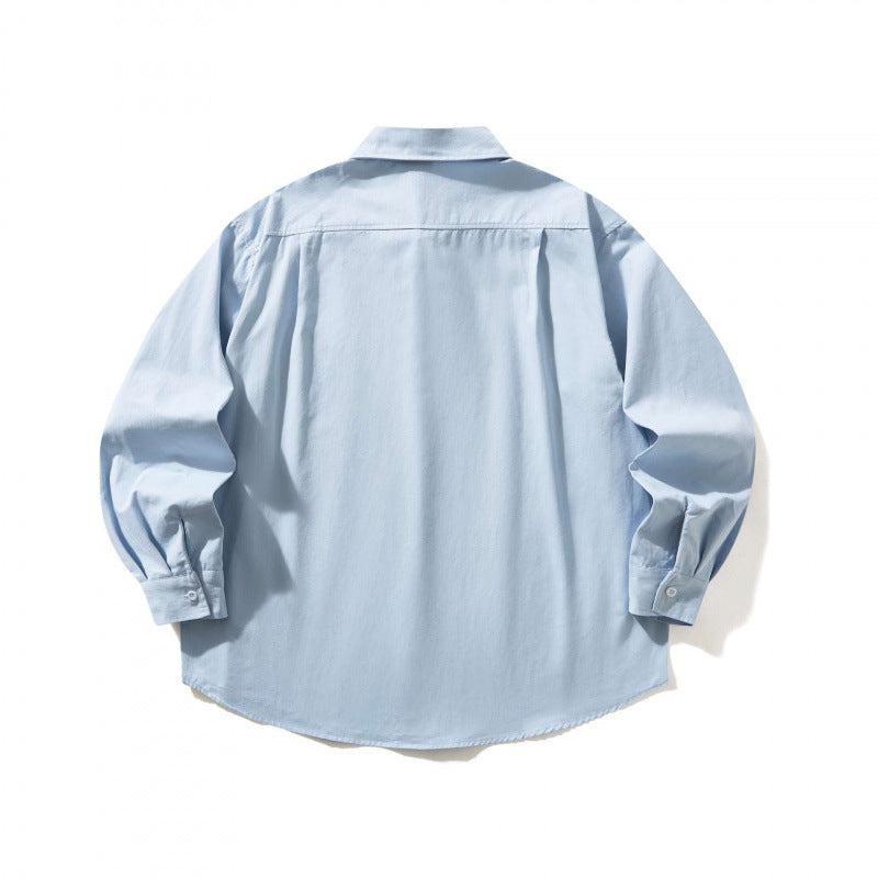 Unisex Oversized shirt with button-down collar, chest pocket and rounded hem Fashion Glam