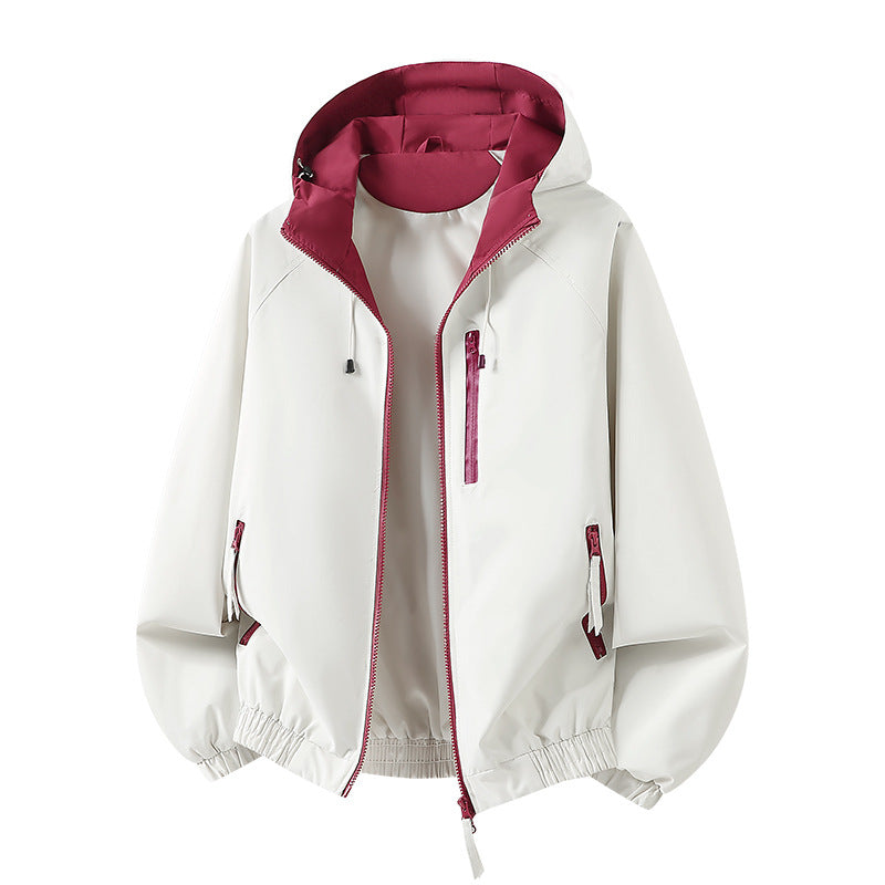 Women's lightweight hooded shell jacket in urban look with contrasting lining, zippered pockets, and elastic hem Fashion Glam