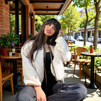 Women's short jacket in teddy look with decorative ribbons and contrasting piping Fashion Glam