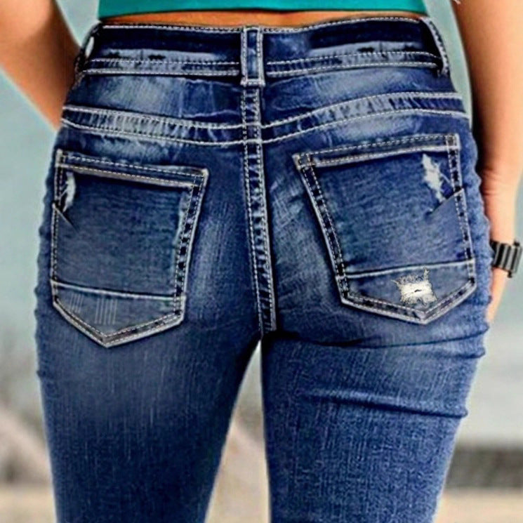 Women's cropped jeans with turn-up, mid-rise waist and used wash Fashion Glam