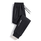Men's Sporty Jogging Pants with Zipper Pocket, Drawstring, and Elastic Cuffs Fashion Glam