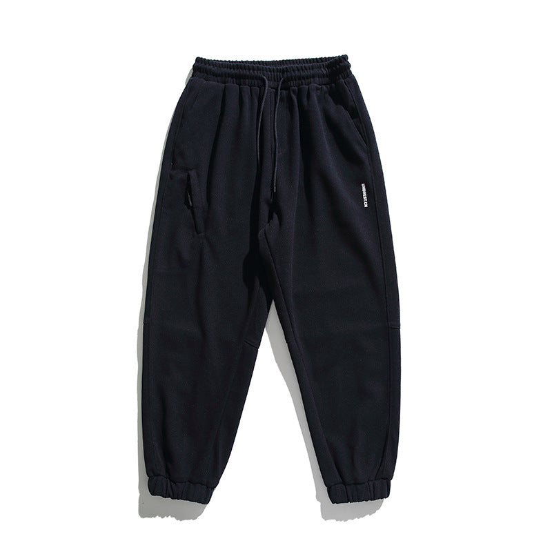 Unisex wide jogging pants in oversized cut with elastic waistband, knee panel and ribbed cuffs Fashion Glam