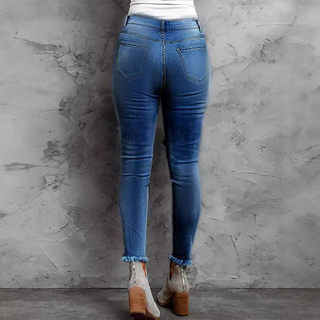 Women Stretch Skinny Jeans with High Waist, Knee Ripped Details and Leo Underlay Fashion Glam