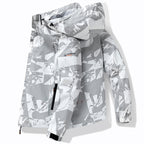 Men's technical waterproof hooded jacket with graphic camouflage print, zippered pockets, and adjustable hem Fashion Glam