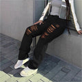 Women's high-cut wide denim jeans with pronounced ripped details and a casual fit Fashion Glam