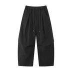 Unisex wide layered pants with balloon-shaped silhouette, high waist and drawstring Fashion Glam