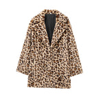 Women's faux fur coat in oversized cut with lapel collar, tie belt and pockets Fashion Glam