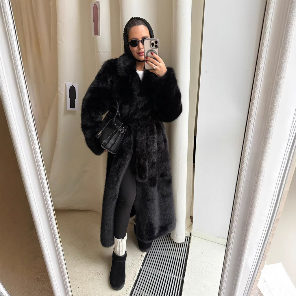 Women's elegant long pile faux fur coat with hood and tailored silhouette Fashion Glam