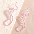 Ladies earrings in elegant wave pattern Fashion Glam