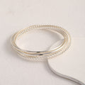 Women's bangle set with elaborate, braided and simple designs Fashion Glam