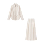 Women Two-piece ensemble consisting of fitted blouse with tie and high-waisted palazzo pants Fashion Glam