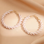 Ladies hoop earrings with luxurious pearl accents and elegant, twisted design Fashion Glam