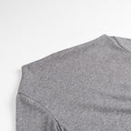 Women’s asymmetrical fine knit top with off-the-shoulder neckline and gathered side panel Fashion Glam
