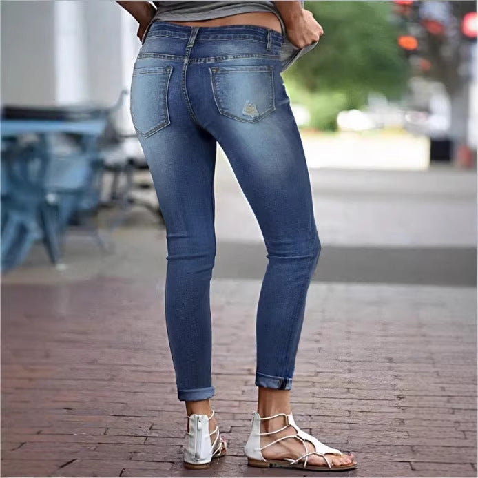 Women's Cropped Slim-Fit Denim Pants with mid-rise waist, cuffed hem and subtle used look Fashion Glam