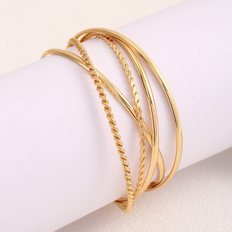 Women's bangle set with elaborate, braided and simple designs Fashion Glam