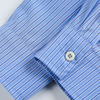 Women's oversized shirt with fine pinstripes, chest pocket, and classic Kent collar Fashion Glam