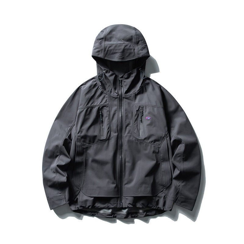 Unisex Technical Softshell Field Jacket with welded seams, four zippered pockets, and extended back part Fashion Glam