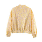 Women's short cut quilted bomber jacket with floral jacquard texture, elastic hem and patch pockets Fashion Glam