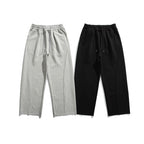 Unisex Loose Cotton Fleece Jogging Pants with Drawstring, Decorative Front Seams and Raw Hem Fashion Glam