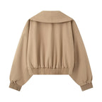 Women's short jacket with wide shawl collar, tailored tie belt and balloon sleeves Fashion Glam