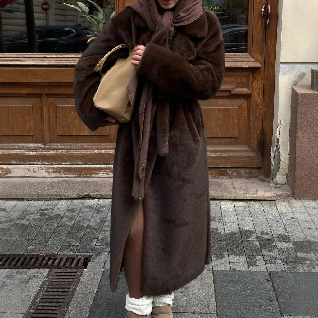 Women's elegant long pile faux fur coat with hood and tailored silhouette Fashion Glam