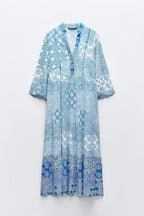 Women's maxi dress in patchwork print with V-neck, tiered skirt, and 3/4 sleeves Fashion Glam