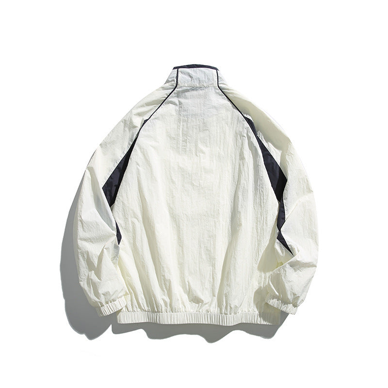 Unisex Lightweight Boxy Hooded Jacket in Windbreaker Style with Contrast Panels and Raglan Sleeves Fashion Glam