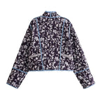 Women's quilted short jacket in kimono style with floral quilted look and contrasting piping Fashion Glam