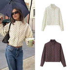 Women's short dotted jacket in blouson style with stand-up collar and balloon sleeves Fashion Glam