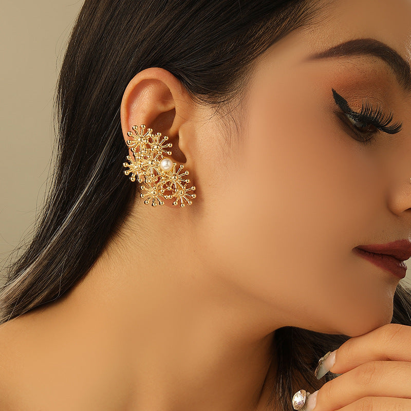 Women’s ear clips with elaborate flower design and pearl accent Fashion Glam