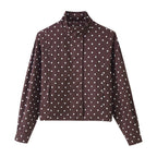 Women's short dotted jacket in blouson style with stand-up collar and balloon sleeves Fashion Glam