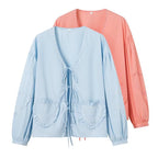 Ladies Playful V-Neck Blouse with Ruffled Heart Pockets and Front Ties Fashion Glam