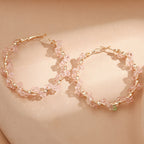 Ladies hoop earrings with luxurious pearl accents and elegant, twisted design Fashion Glam