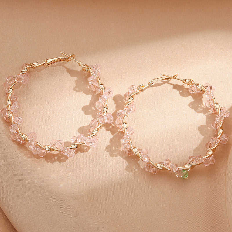 Ladies hoop earrings with luxurious pearl accents and elegant, twisted design Fashion Glam