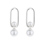 Women's stud earrings with modern oval design and elegant pearls Fashion Glam
