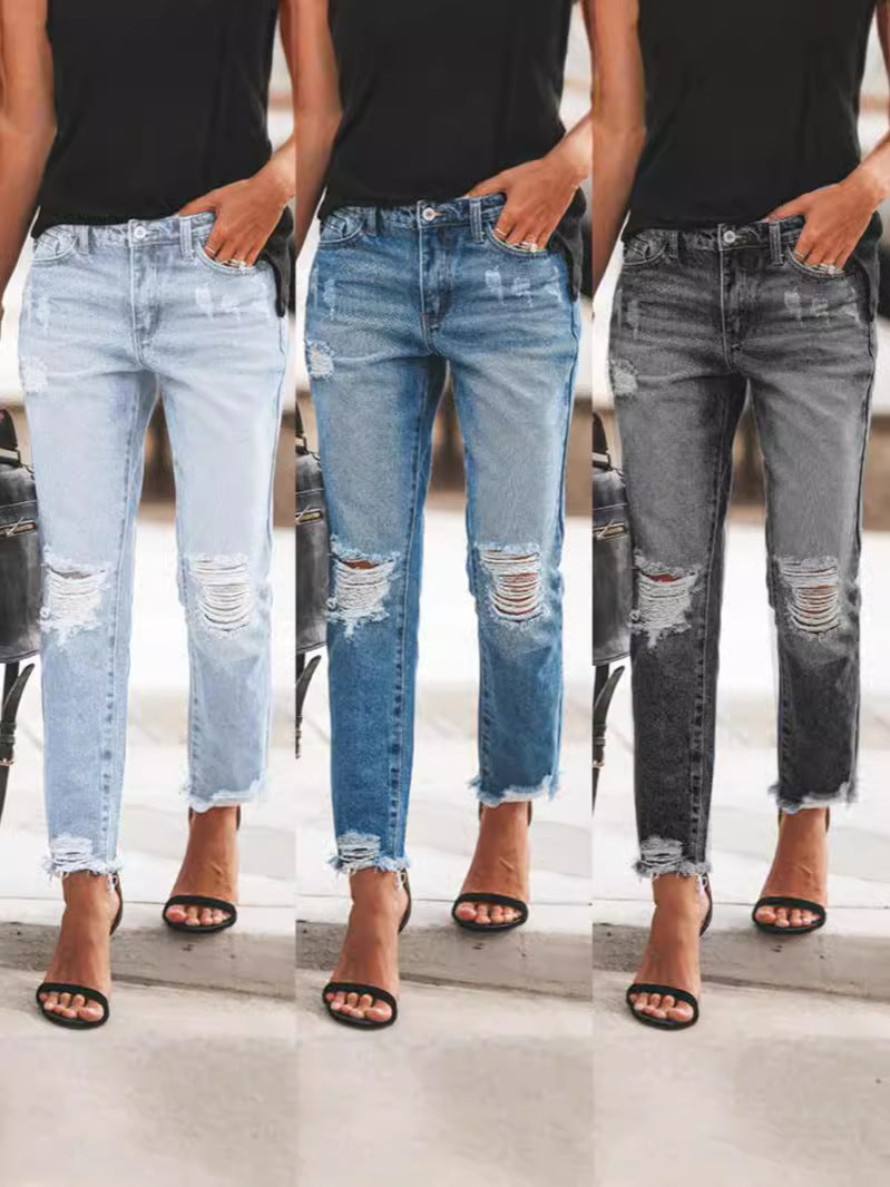 Women's Ripped Denim Jeans with Casual Cut and Frayed Hem Fashion Glam